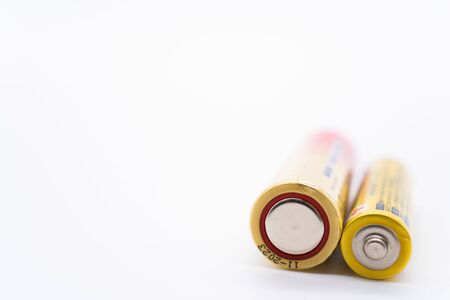 AA and AAA batteries on white backgroundの写真素材