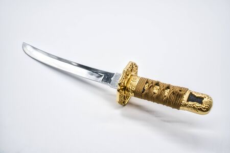 Japanese imitation sword on a white backgroundの写真素材