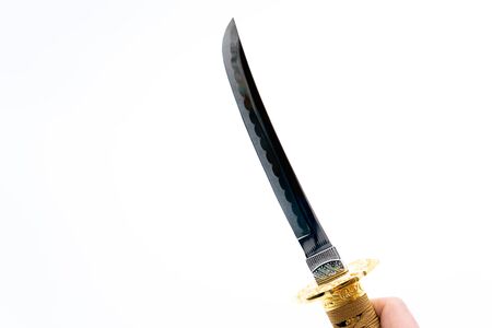 Japanese imitation sword on a white backgroundの写真素材