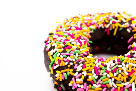 Color spray chocolate donut on white backgroundの写真素材