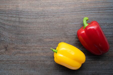 Red and yellow fresh paprika peppersの写真素材