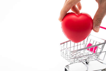Shopping cart with heart symbolの写真素材