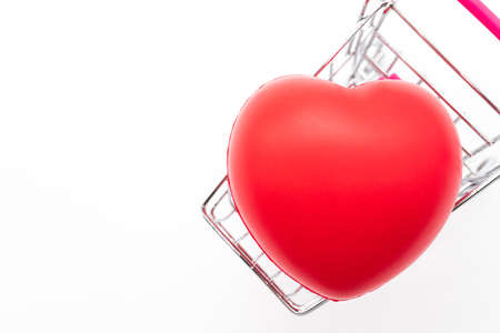 Shopping cart with heart symbolの写真素材