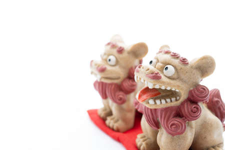 The Shisa is an Okinawan lion dog statue.
Okinawan guardian lions.の写真素材