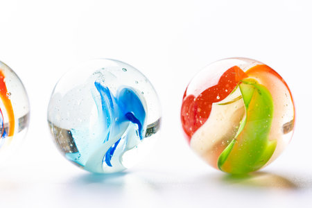 Colorful marbles on a white background