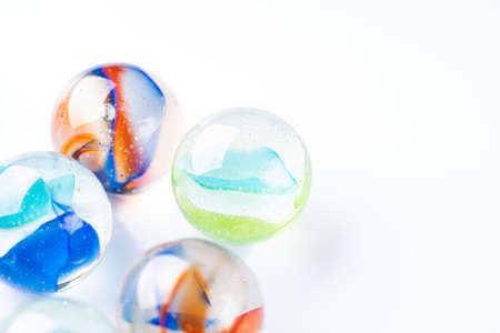 Colorful marbles on a white background