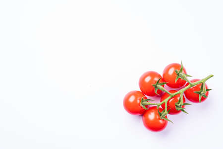 Cherry tomatoes with bunchesの写真素材