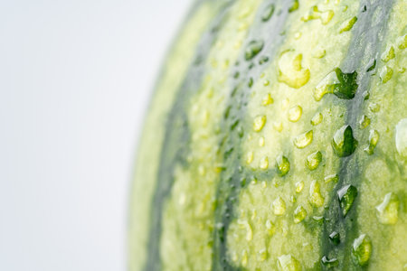 Cold watermelon with water dropletsの写真素材