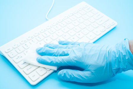 Alcohol disinfection of the keyboardの写真素材