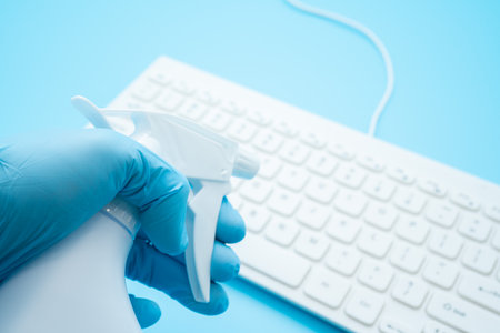 Alcohol disinfection of the keyboardの写真素材