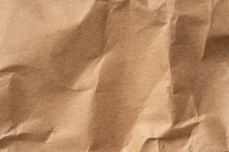 Wrinkled kraft paper background materialの写真素材