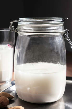 Jar of fresh homemade almond milkの写真素材
