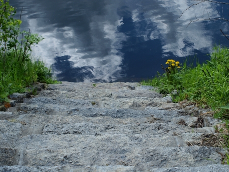 stone stairs into the pond . South Bohemiaの写真素材