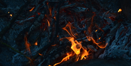 hot coals in an outdoor fireplace. South Bohemia, Czech Republicの写真素材