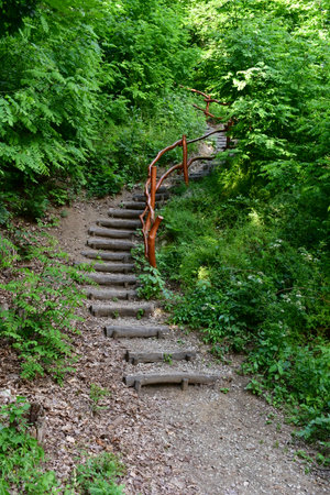 wooden stairs leading to a park with children's attractions, the city of Vodnany, Czech Republic