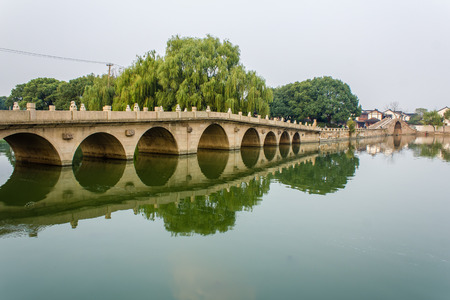 stone bridge at Shihu Lake in Suzhouの写真素材