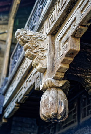 Close up view of wooden carved eavesの写真素材