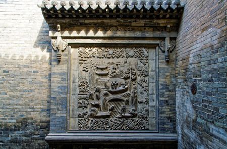View of Wang's residential courtyard brick wall in Shanxi, Chinaのeditorial素材