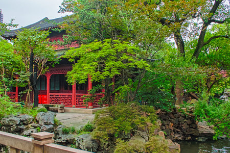 Traditional Chinese style pavilion by the lake in the garden, Chinaの写真素材