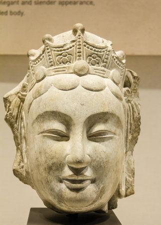 Statue of a seated buddha in the Museum of Chinaの写真素材
