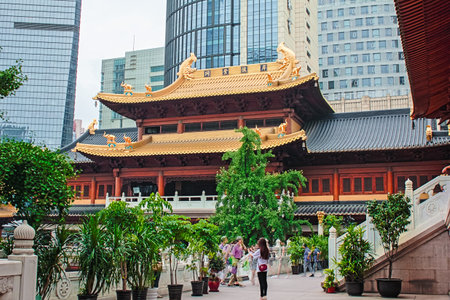 Tourists visit Chinatown in Singapore. Singapore is one of the most densely populated cities in the...