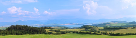 Liptov panorama with Low Tatras (Nizke Tatry) and Liptovkska Mara water lake reservoir in the background. Summertime in the Northern Slovakia, Slovak Republic, Europe.の写真素材