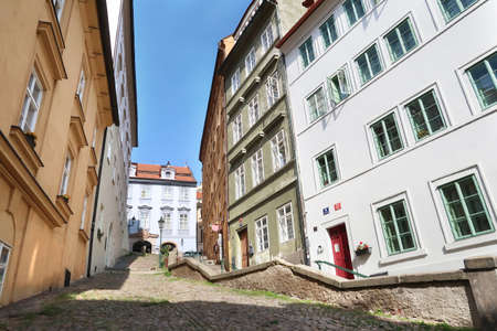 Typical ancient street in Mala Strana, an old part of Czech city Prague in late summer.の写真素材