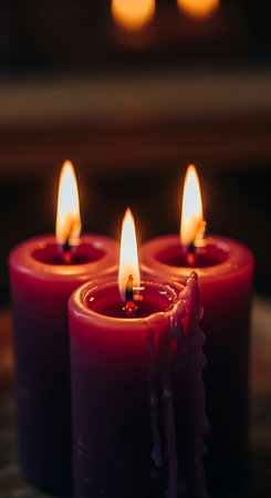 Burning candles in a church. Selective focus. Shallow depth of fieldの素材
