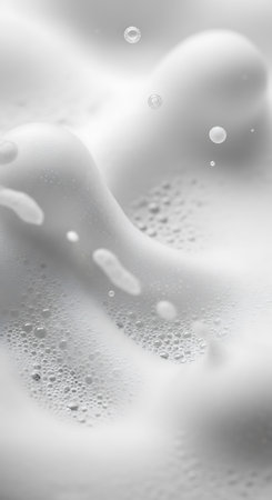 close up of soapy foam on white background with bubbles, macroの素材