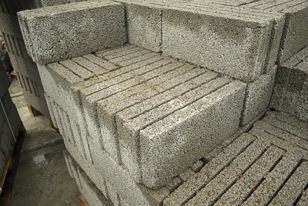 stacked rough building blocks outdoorの写真素材