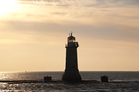 Lighthouse in the sunsetの写真素材