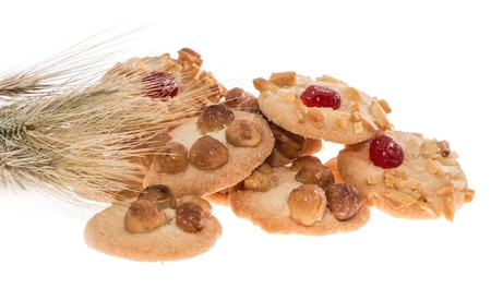 Heap of mixed Cookies with wheat isolated on whiteの写真素材