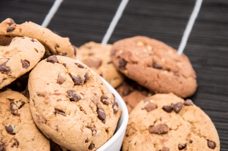 Mixed Cookies on a bowl on black backgroundの写真素材