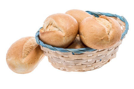 Small basket filled with buns isolated on whiteの写真素材
