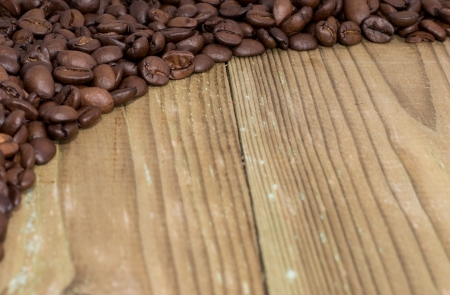 Coffee Beans on wooden backgroundの写真素材
