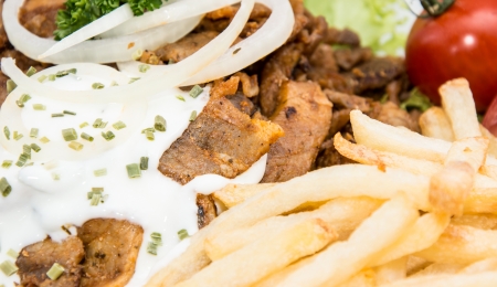 Portion of Kebab with Chips and Sauce (macro shot)の写真素材