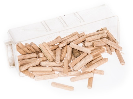 Dowels in a box isolated on white background