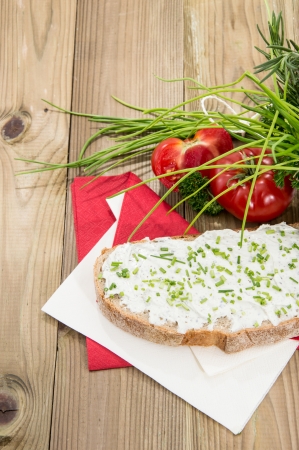 Creme Cheese with Chives on wooden backgroundの写真素材