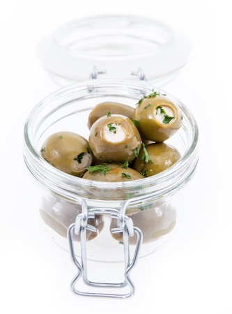 Olives in a Glass isolated on white backgroundの写真素材