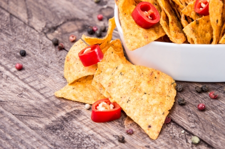 Bowl of Nachos with Salsa Sauce on woodの写真素材