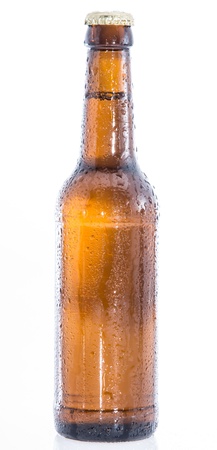 Wet bottle of Beer isolated on white backgroundの写真素材