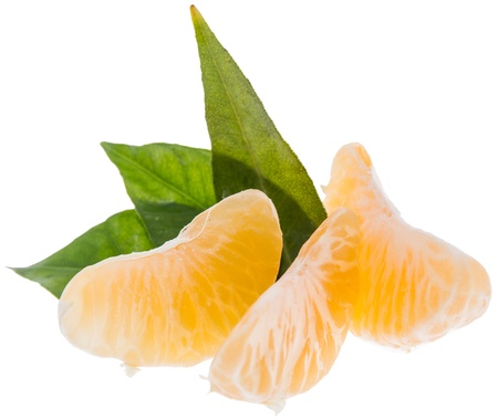 Tangerine pieces isolated on white backgroundの写真素材