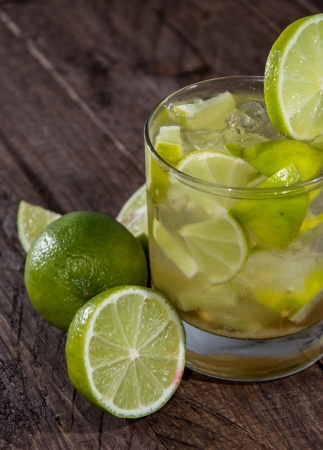 Fresh made Caipirinha on wooden backgroundの写真素材