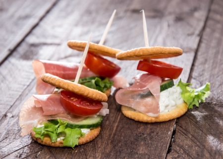 Crackers with Ham, Cream Cheese and Vegetablesの写真素材