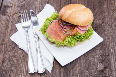 Smoked Salmon with lettuce on a bunの写真素材