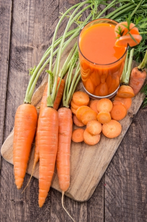Carrot Juice with fresh carrotsの写真素材
