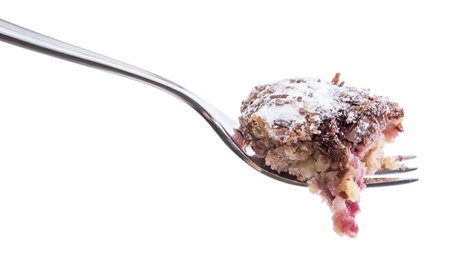 Chocolate Cake on a fork isolated on whiteの写真素材