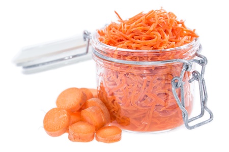 Glass with Carrot Salad isolated on white backgroundの写真素材