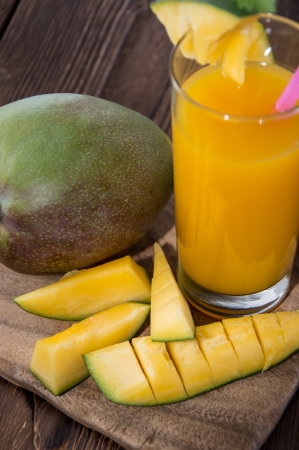 Fresh made Mango Juice with fruitsの写真素材
