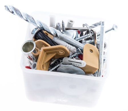 Different small parts (nails, screws...)  isolated on white backgroundの写真素材